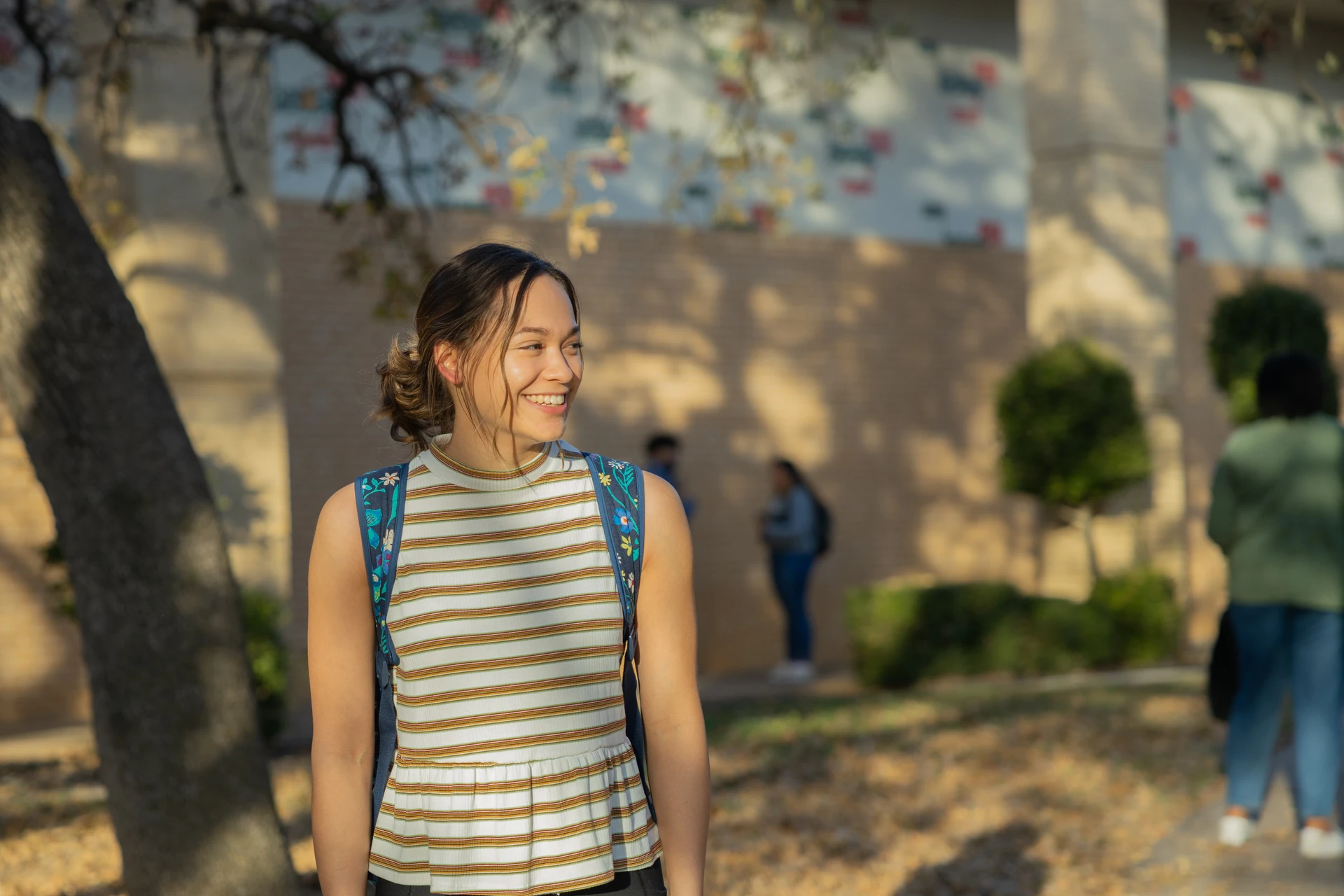 SWAU student smiling on campus life fall semester