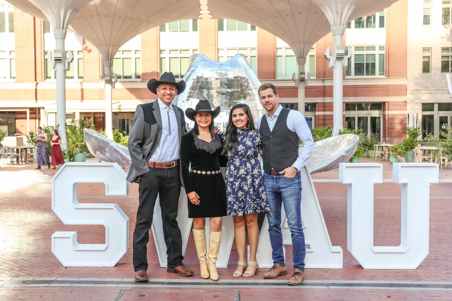 People in front of SWAU sign