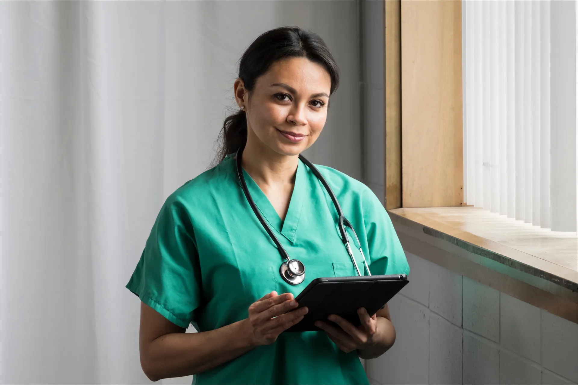 nurse holding a clipboard