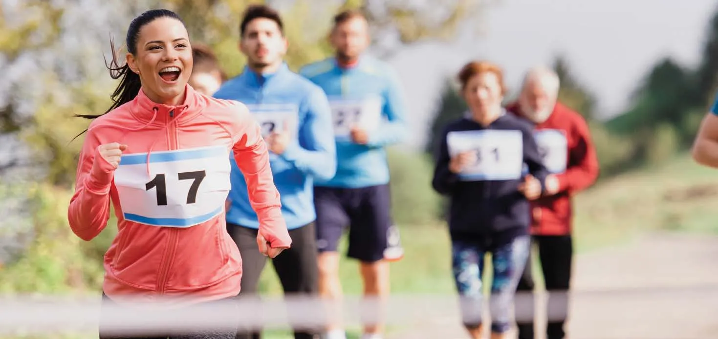 Adults running in a race